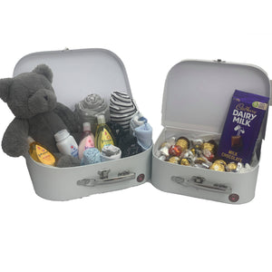 Baby hamper with teddy chocolates bath products and baby clothing items